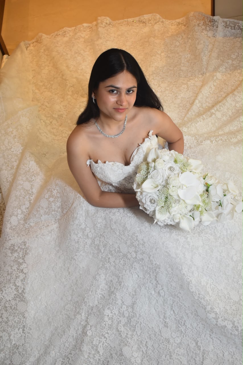 Bridal bouquet of white roses, calla lilies and orchids